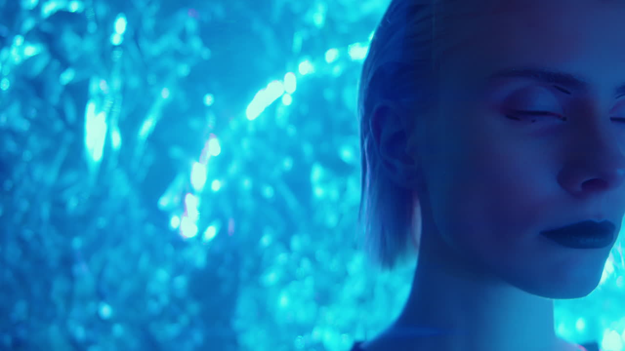 Female Extraterrestrial in Neon Light and Laser Beams