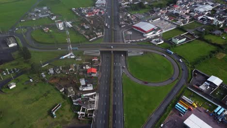 panamericana sur e35 highway road interchange machachi city ecuador aerial view