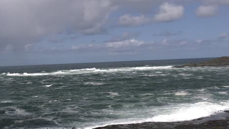 waves crash against beaches