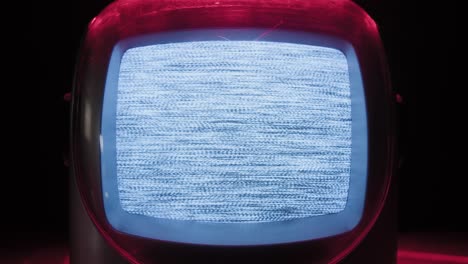 retro tv, vintage television in a nostalgic setup, a retro tv displays grain on screen, scary halloween night device good for chroma key and green screen. high quality 4k footage