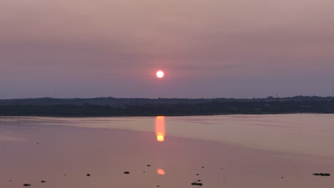 A-sunset-on-Paraná-River,-on-Posadas,-Misiones,-Argentina