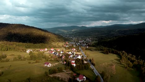 Aerial-shot-of-storm-clouds-and-huge-shadows-over-suburb