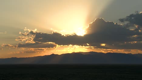 late summer desert sunset over eastern idaho mountains