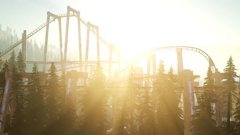 old roller coaster at sunset