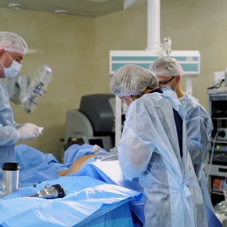 close up of surgery team operating