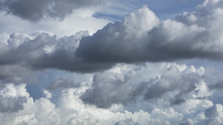 Fast moving time lapse of dramatic clouds in mid afternoon