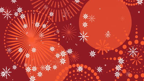 snowflakes falling over red and orange festive fireworks in winter scene animation