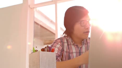 happy hipster using his laptop