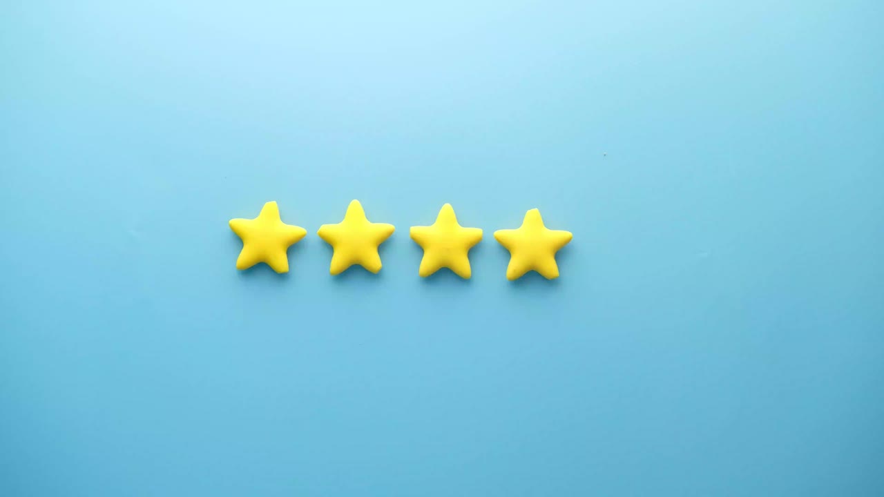 Hand Placing a Star Rating