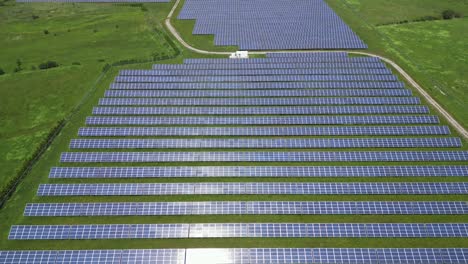 Drone-Flying-Above-Solar-Energy-Farm-In-Summer