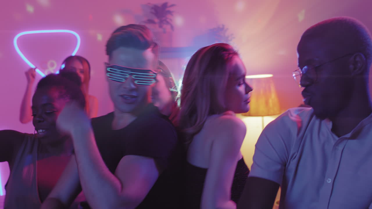 Group of People Partying at Home