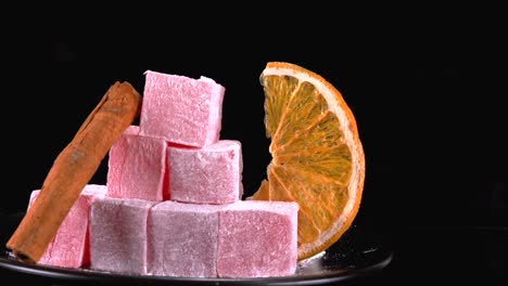 delicious sweet looking turkish delight against black background