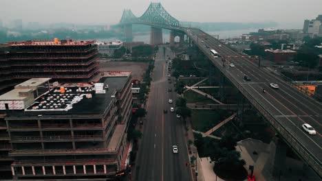 drone shot of jacques cartier bridge during smog episode in montreal in june 2023