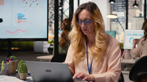 vertical video ambitious entrepreneur writes a report informed by real time data insights