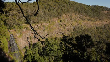 Wide-handheld-view-of-Morans-Falls-in-afternoon-light,-Lamington-National-Park,-Scenic-Rim,-Queensland,-Australia