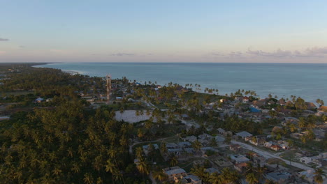 volando sobre bungalows de lujo en la exótica isla de zanzíbar al atardecer