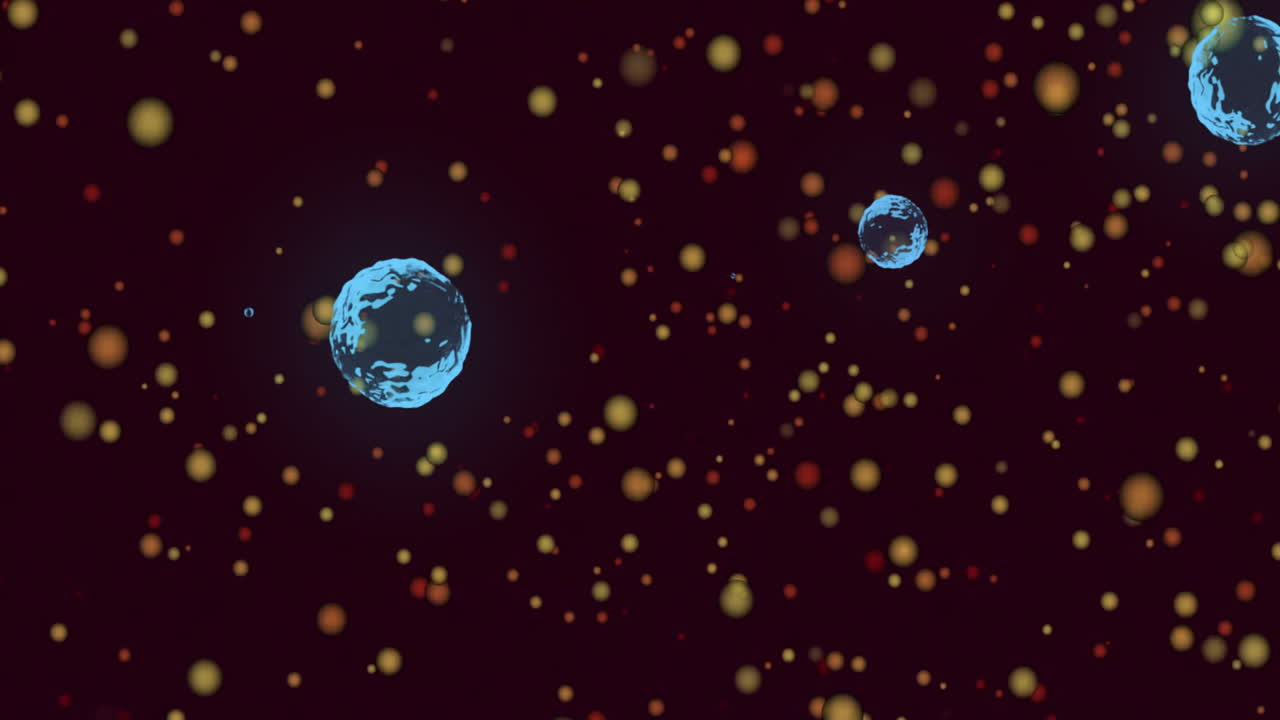 Floating blue and orange particles resembling cosmic animation in dark space