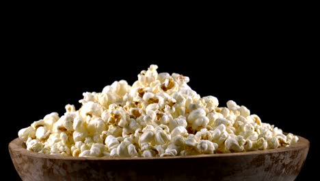 popcorn in a wooden bowl rotates