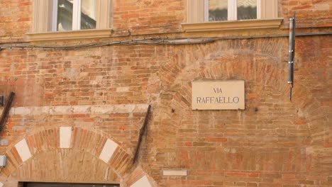 medieval architectures at the street via raffaello in urbino, marche, italy, europe