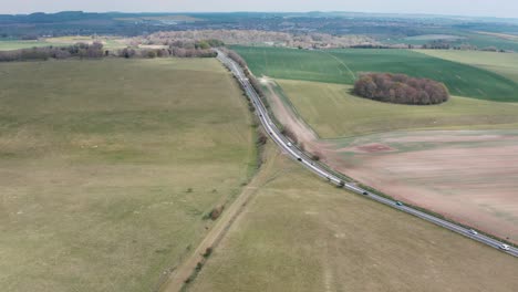 Aerial-drone-shot-over-A303-UK-countryside-highway-road