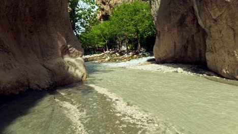 Fast-flowing-rivers-meet-at-Saklikent-gorge-narrow-steep-sided-ravine