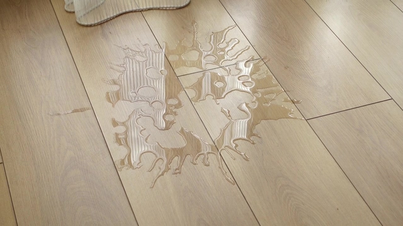 Water Spill on Light Wood Laminate Flooring