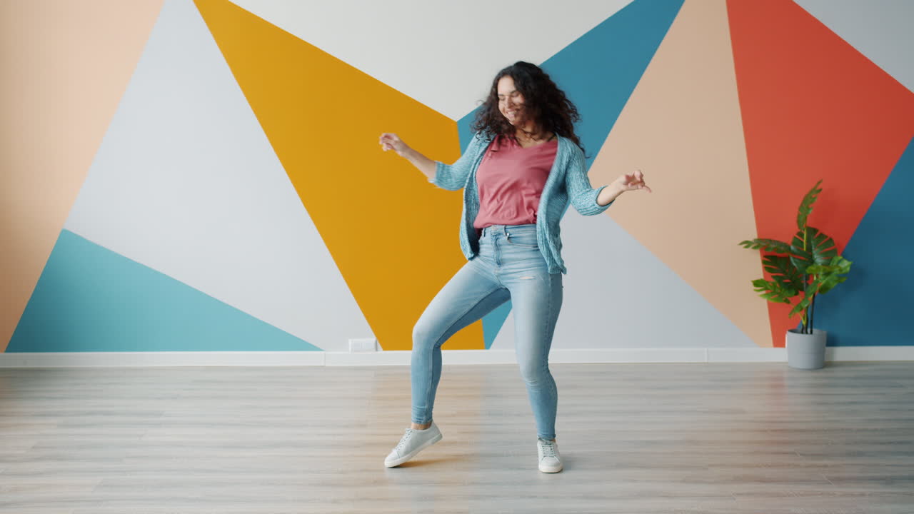 Woman Dancing in a Colorful Room