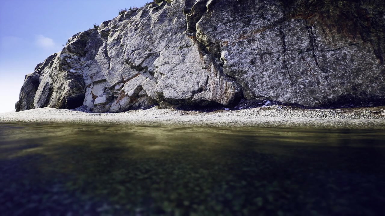 Midday coast featuring stratified stones and quiet mirrorlike waters