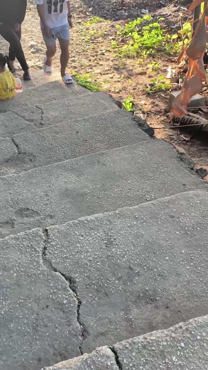 People Walking Up Concrete Stairs Outdoors