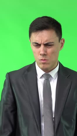 businessman counting fingers while thinking and calculating