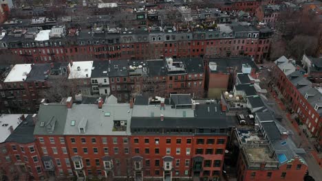 aerial footage of brownstone buildings in historic city