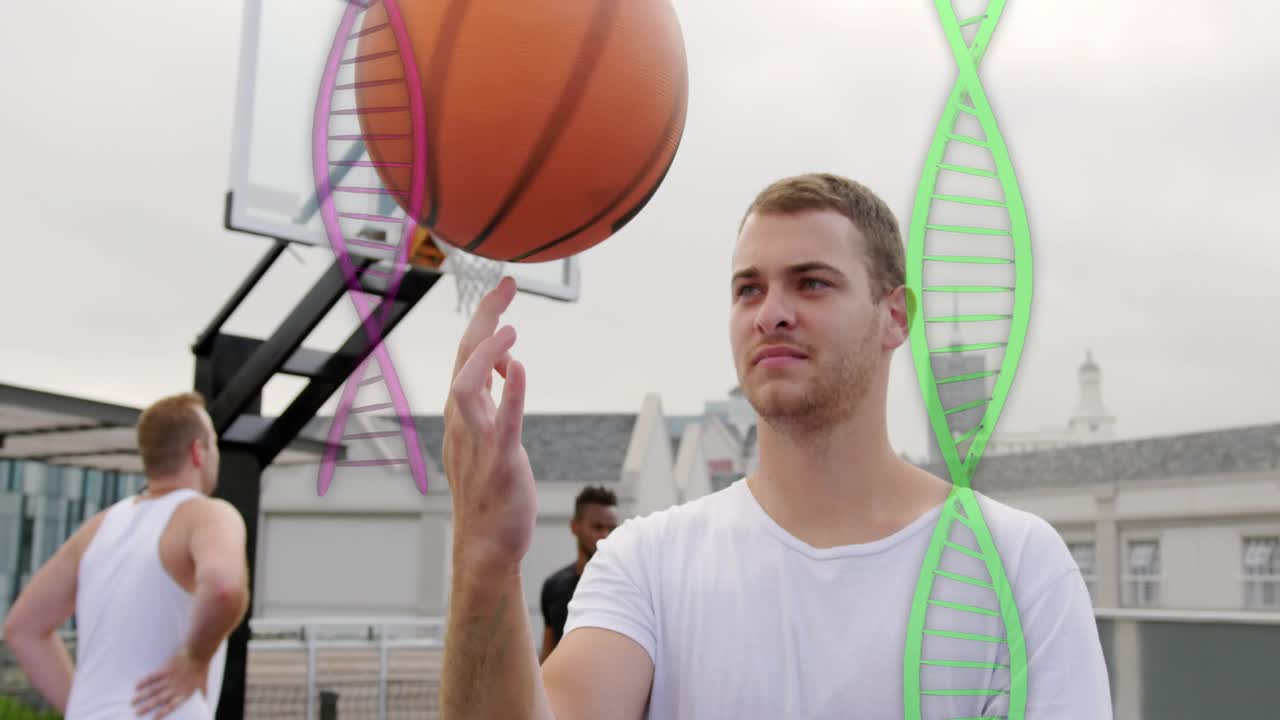 Man picking and tossing ball spinning ball on finger wowing team with health helix framing sides