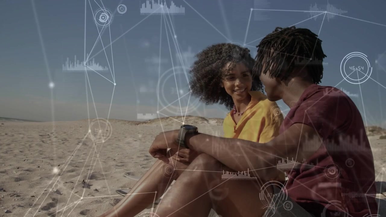 Couple sitting and connecting on beach man checking smartwatch causing animated tech graphs growing
