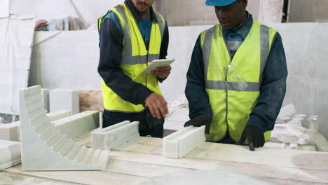 workmates in a marble factory