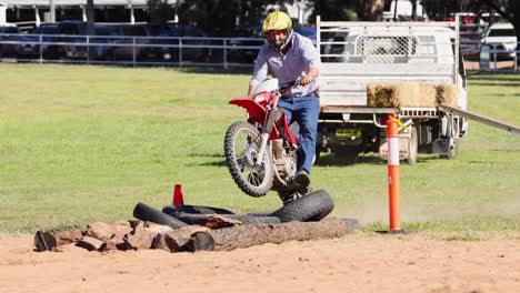 rider competes in log pulling event