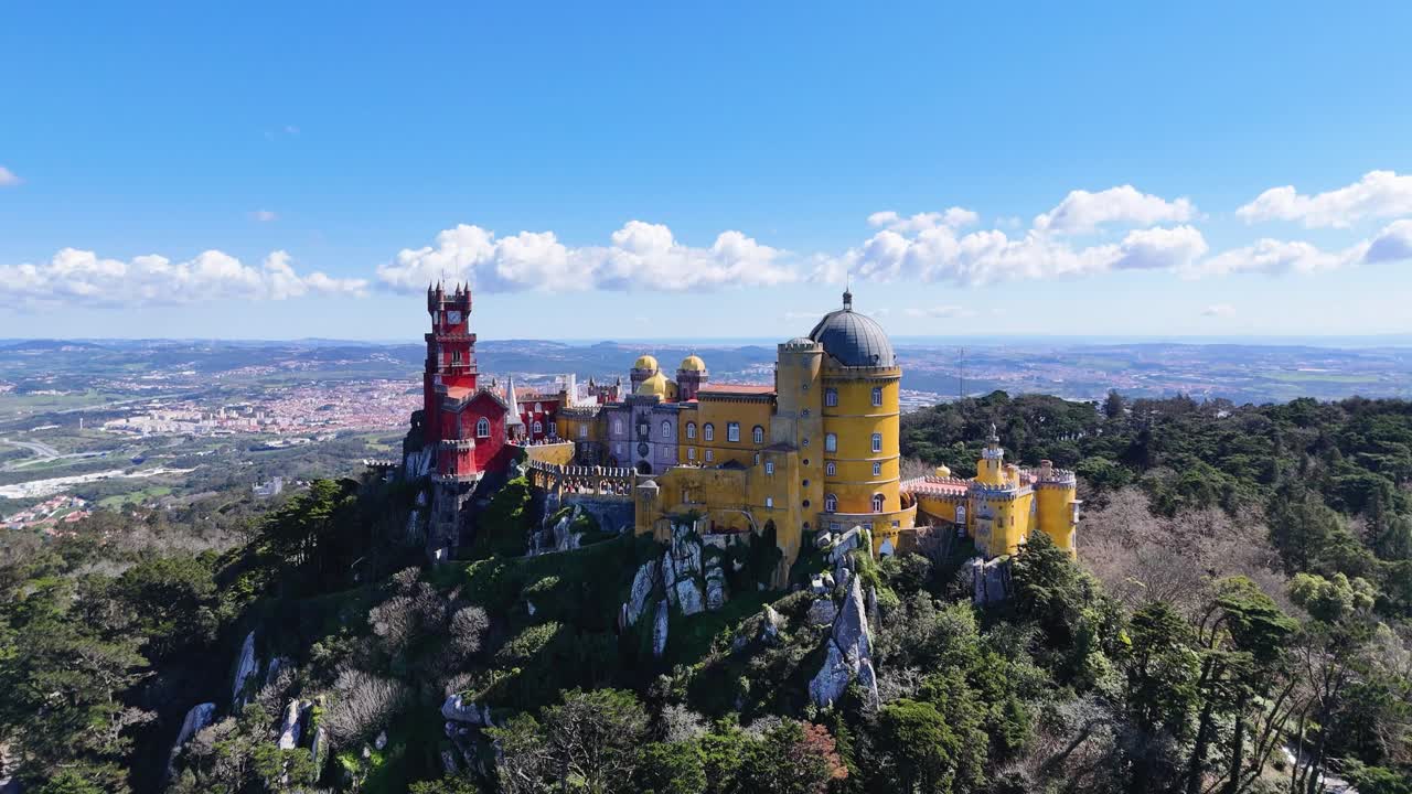 Drone footage showing colorful Pena Palace and scenic landscape