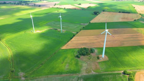 Aerial-view-of-powerful-Wind-turbine-farm-for-energy-production-on-beautiful-cloudy-sky-at-highland