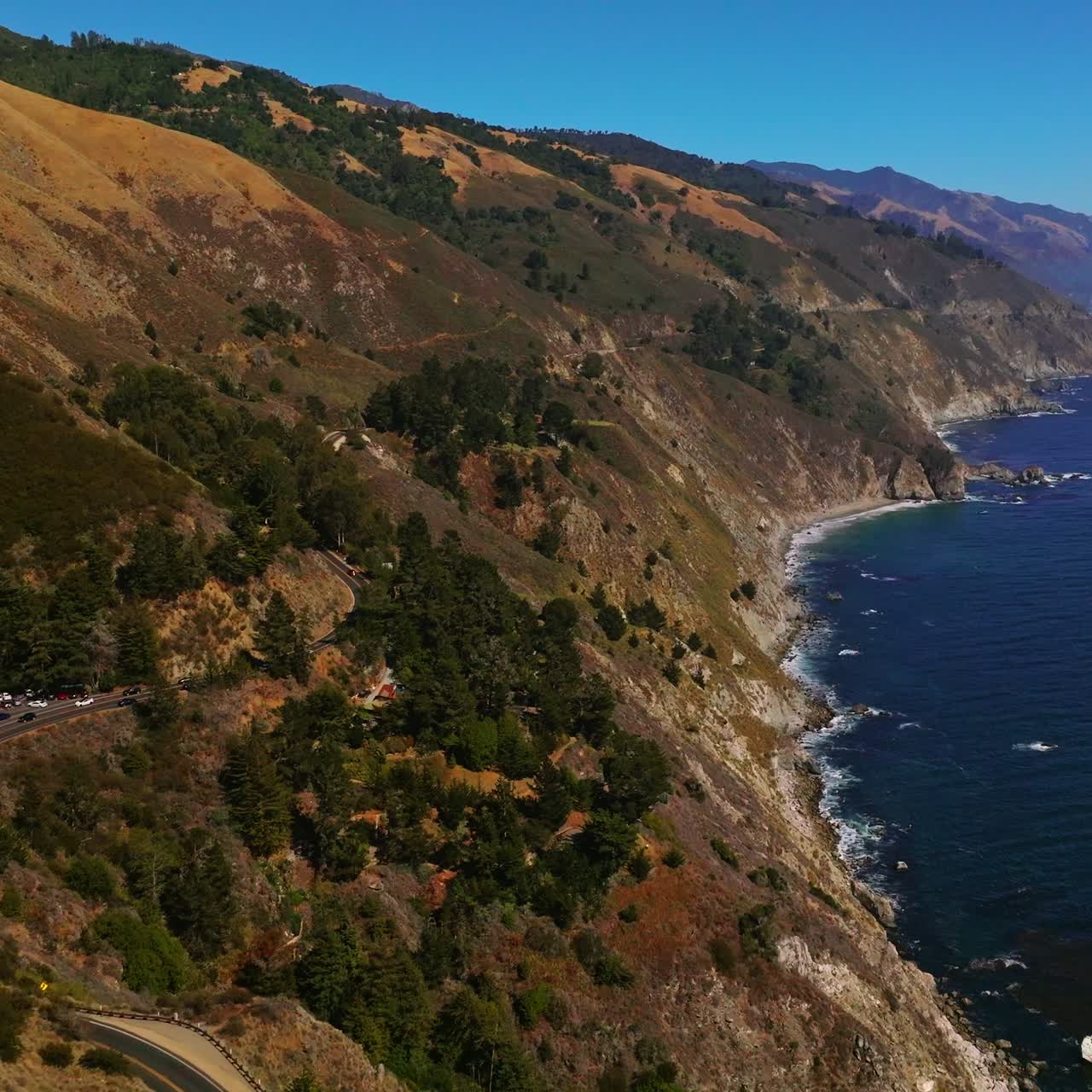 Summer cliff coastline scenery. Huge rocky shore aerial view