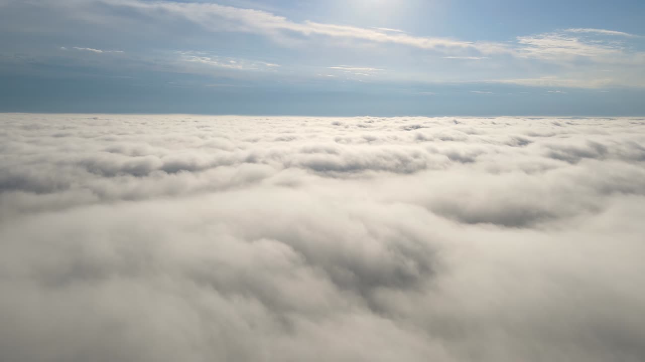 Flying in the clouds flying in the clouds. The clouds are moving on camera. Flying through the cloud