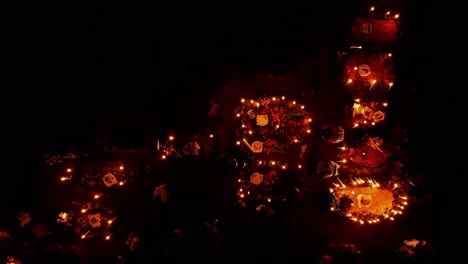 DRONE: TOP DOWN VIEW OF TOMBS AT A GRAVEYARD AT PACANDA ISLAND IN PATZCUARO MICHOACAN