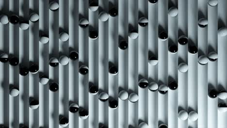 bright colorful background with rolling balls along the paths. plastic ball rolling in geometry deepening. 3d animation of a seamless loop