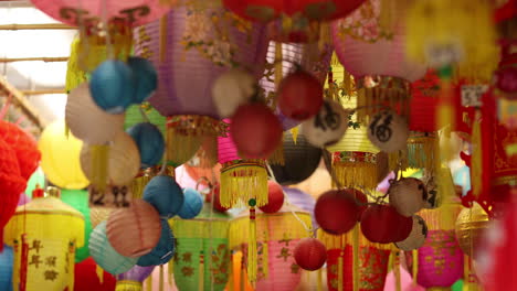 chinese lanterns hanging in a shop at chinatown