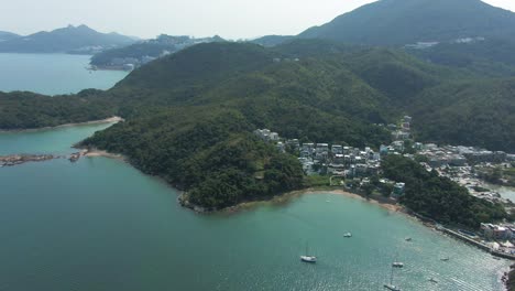 hong kong bay with hundreds of small sail boats, aerial view