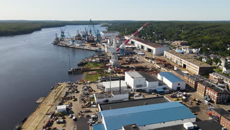 slow aerial descent of bath iron works, showing the kennebec river