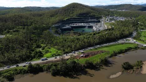 oxenford, gold coast, 4 january 2024 - left to right aerial views of the coomera river and oxenford quarry