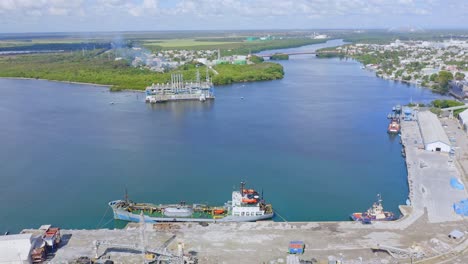 Aerial-view-showing-harbor-of-SAN-PEDRO-DE-MACORIS-and-current-generator-island-in-Dominican-Republic