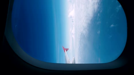 the view from the window of the plane on the wing and clouds.
