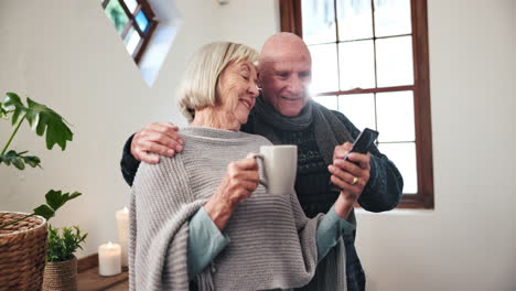 Home,-coffee-and-senior-couple-with-cellphone