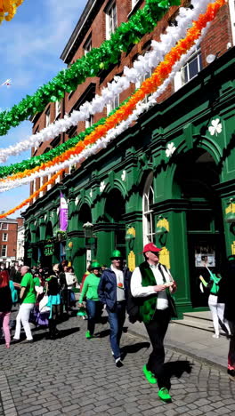 st. patrick's day celebrations on a decorated city street