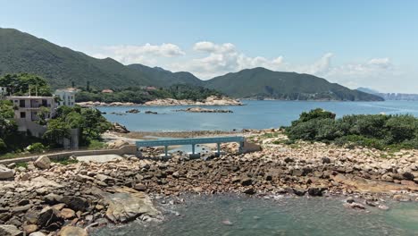 blue lover bridge in shek o, hong kong, aerial drone view